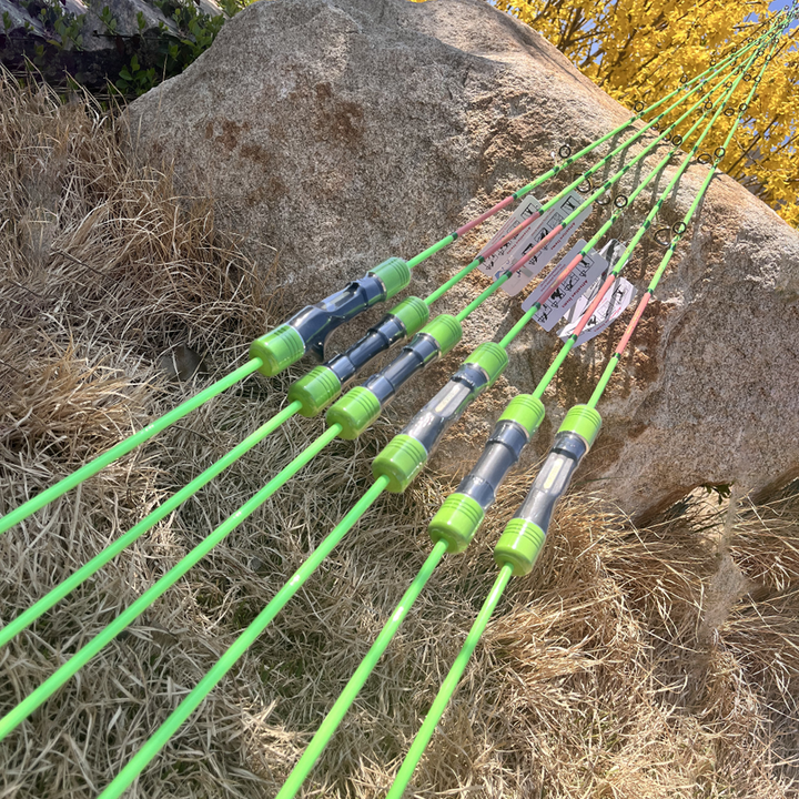 GOOFISH Ares Light rods arranged on a rock showing reel seats and guide configurations