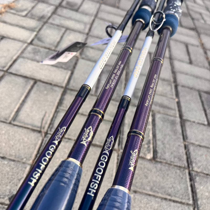 Monster Deep Chameleon-finish rod sections photographed above a wooden deck