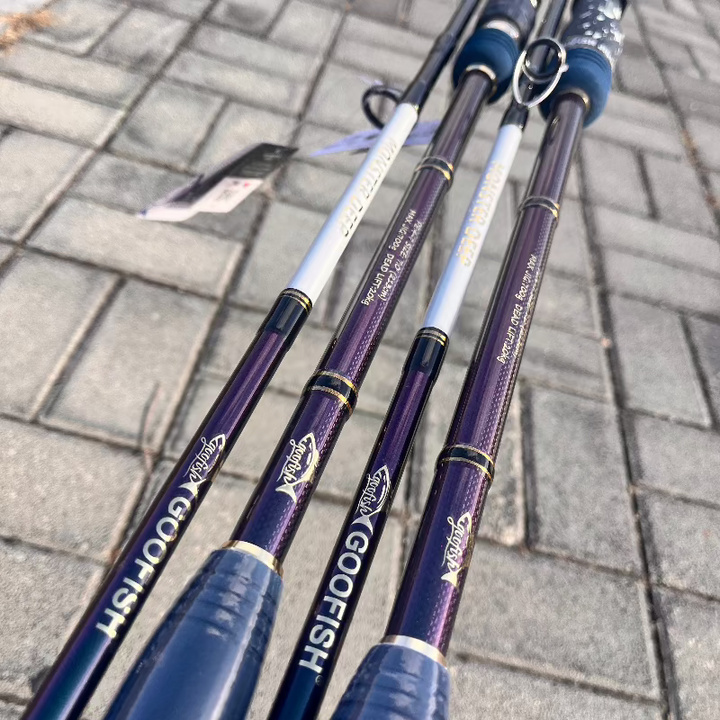 Monster Deep Chameleon-finish rod sections photographed above a wooden deck