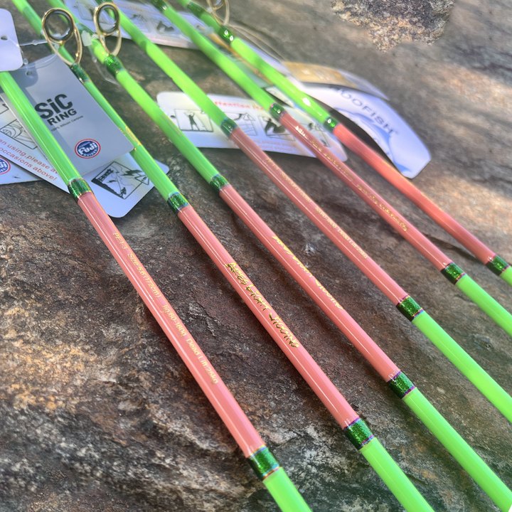 Pink Ares Light blank detailing with green wraps and gold-finish guides