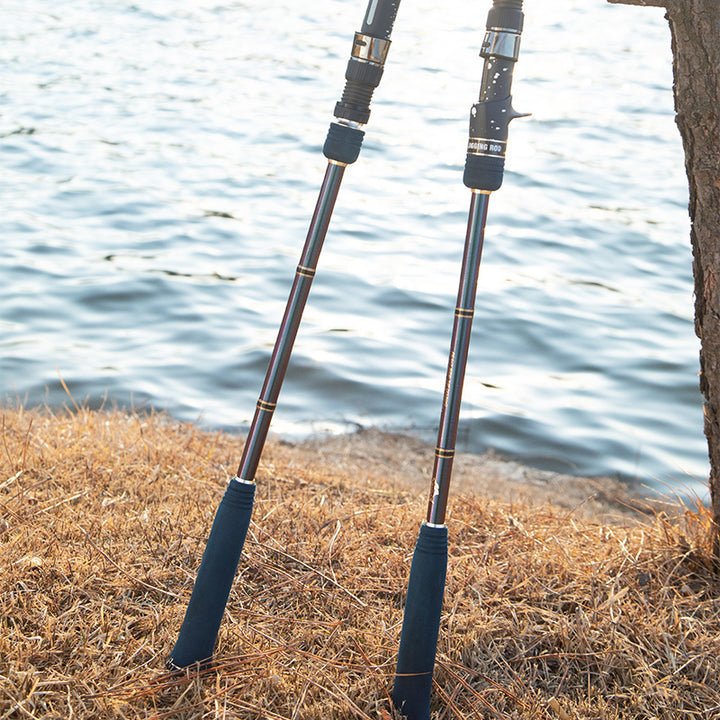 Monster Deep spinning and casting reel seats with extended EVA rear grips beside the water