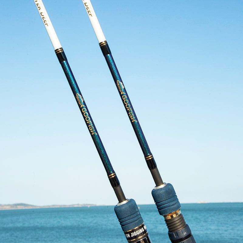 Monster Deep white model markings and Chameleon-finish blanks beside the sea