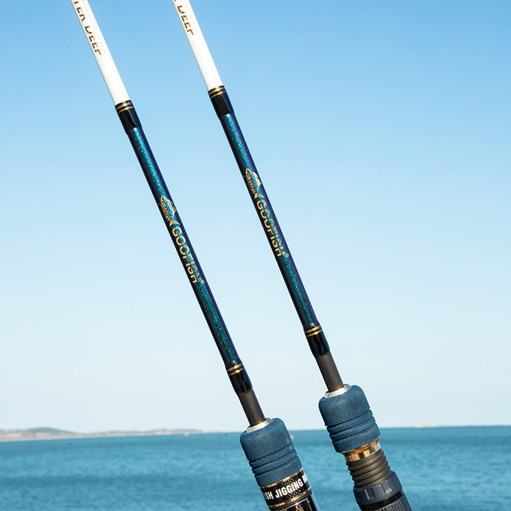 Monster Deep white model markings and Chameleon-finish blanks beside the sea